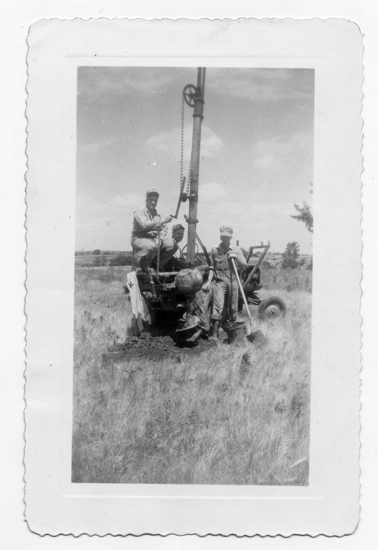 Linemen setting some of the first poles