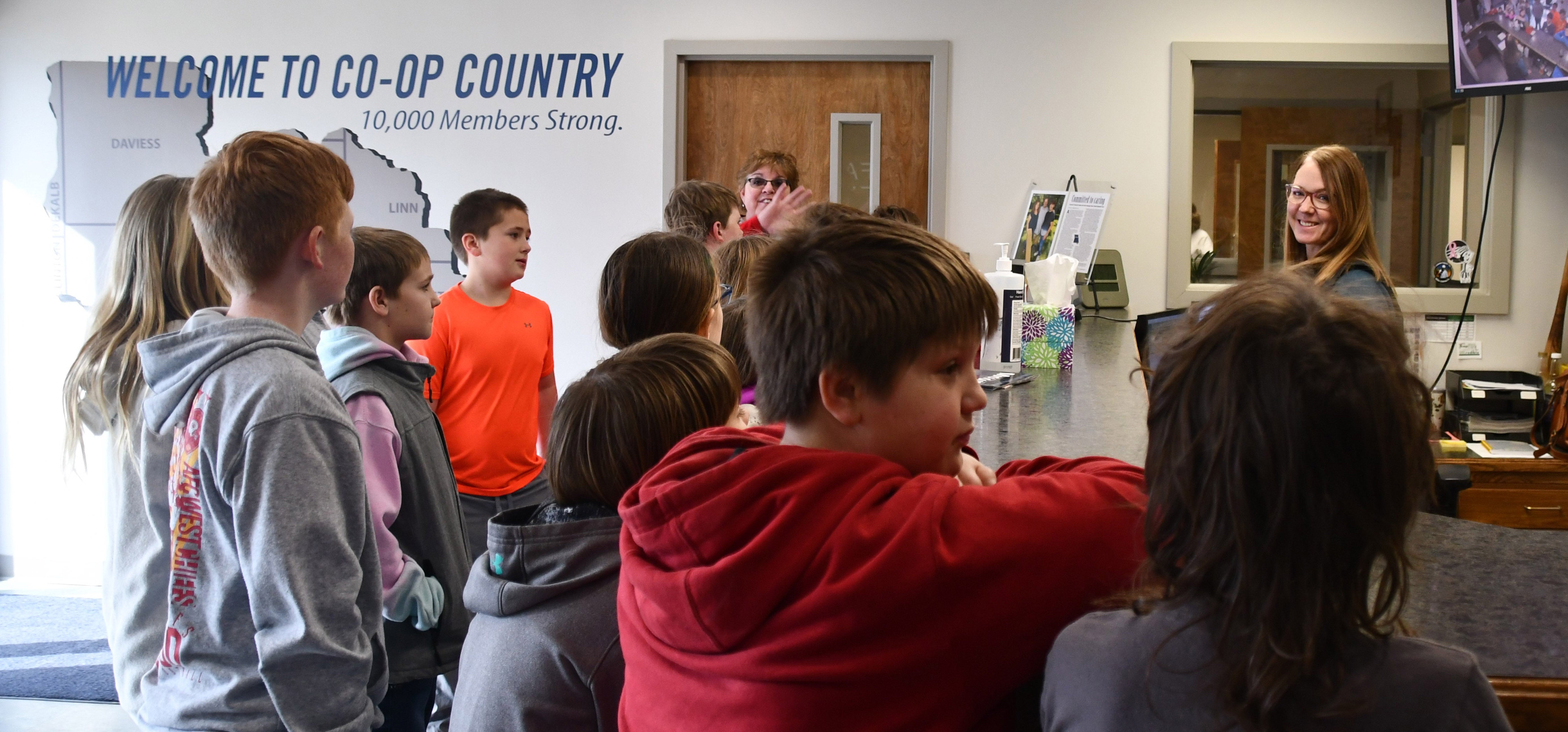 Students visiting the front desk at FEC