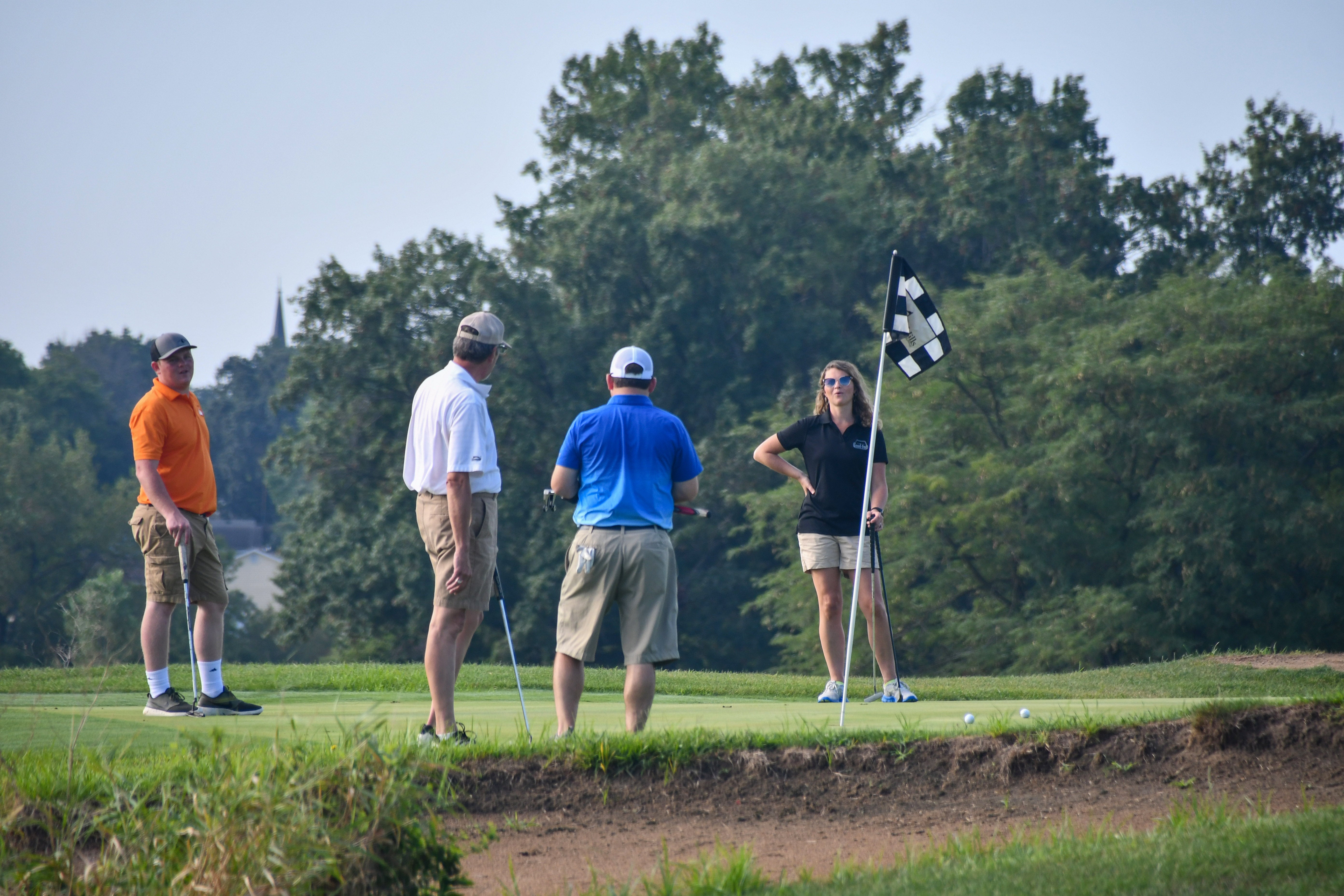 golfers on the course
