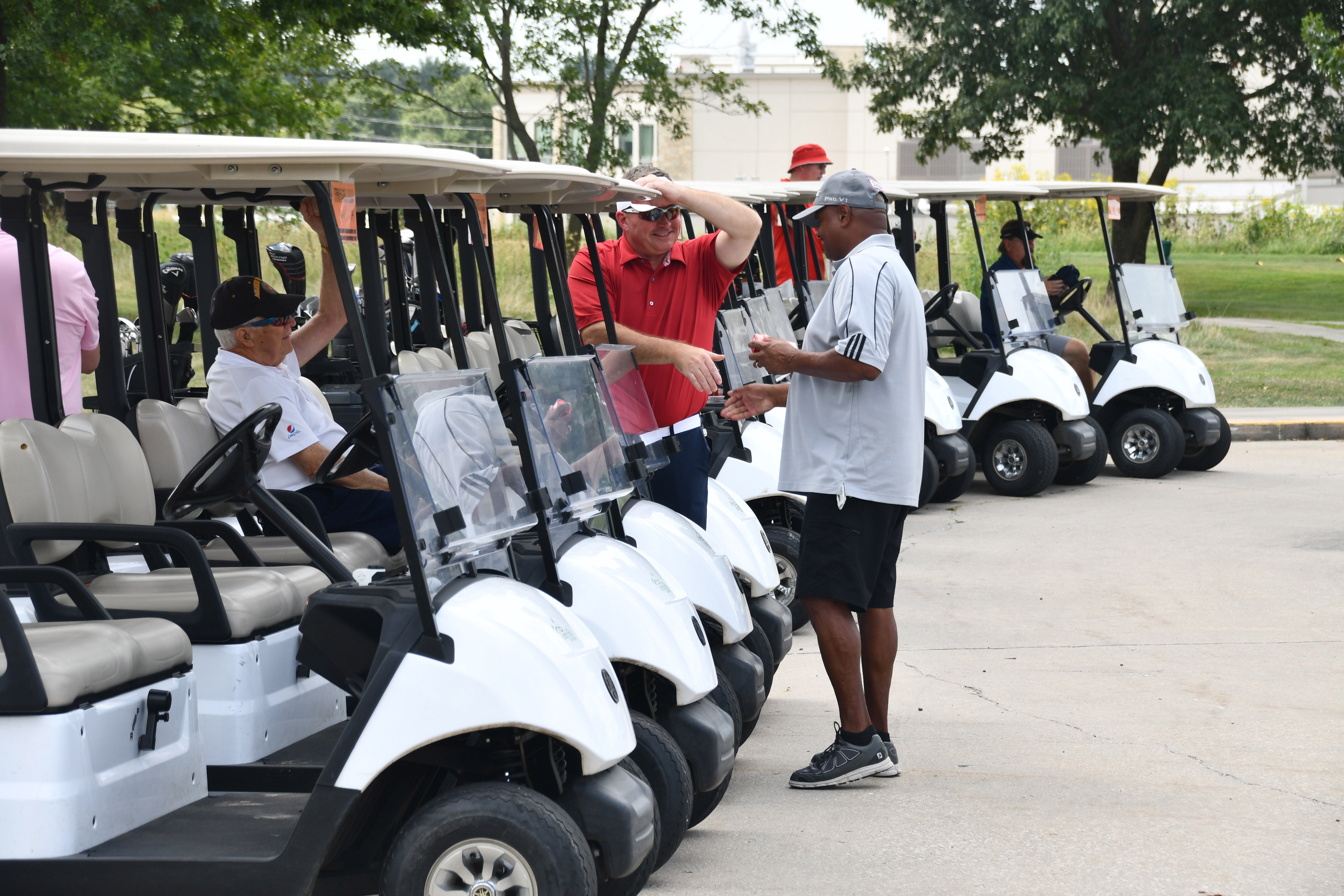 golfers shaking hands